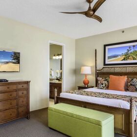 Primary bedroom with balcony.