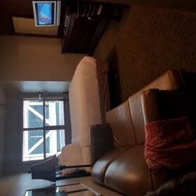 Owners photo of bed and sofabed, looking to window