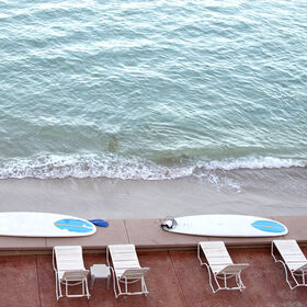 Beachfront relaxation atmosphere - illustrative stock image