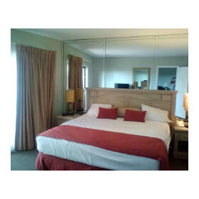 Queen Bed opposite Pull Out Couch