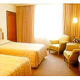 Grand Tower Inn — - Unit Bedroom