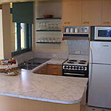 Korora Bay Village — - Unit Kitchen