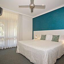 Korora Bay Village — - Unit Bedroom