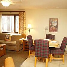 Snow Lake Lodge — Dining and Living Area