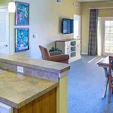 Barefoot Suites — Kitchen and Living Area