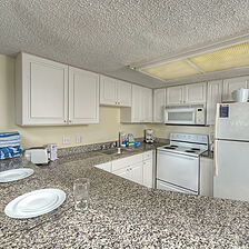 Maritime Beach Club — Sample unit kitchen