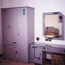 Dive Inn Resort — - Bedroom of a unit