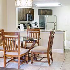 Summer Bay Orlando Resort — Dining area in two-, three-, and four-bedroom units