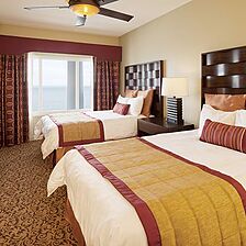 Club Wyndham SeaWatch Resort &mdash; Sample Presidential Suite Bedroom with two full beds