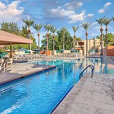 Club Wyndham Orange Tree Golf Resort — Accessible Pool With Loungers and Umbrellas