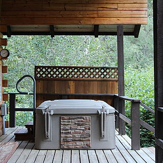 Glacier Wilderness Resort — Your private hot tub on a large covered front porch