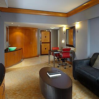 The Hilton Club New York &mdash; Sample unit living area with sleeper sofa