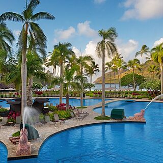 Marriott's Kauai Beach Club — Pool with Bridge to Center Island Lounge Deck