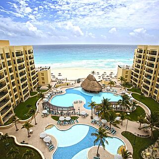 The Royal Sands — Sample Balcony View of Pool Area and Beach