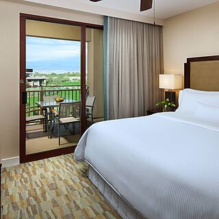 Westin Desert Willow — King bed in the bedroom of the smaller one-bedroom and two-bedroom villas.