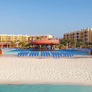 Royal Haciendas — Infinity Pool and Resort Beach With Loungers