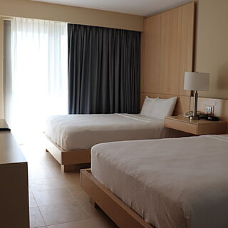 The Mill Resort & Suites — Sample unit bedroom with two queen beds.