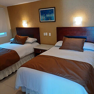 Suites Costa Dorada — Sample Bedroom