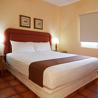 Suites Las Palmas — Sample Bedroom