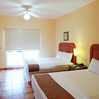 Suites Las Palmas — Sample Bedroom
