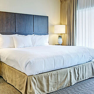 Summer Bay Orlando Resort — Bedroom with one queen bed in all units