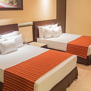 Sunset Plaza Beach Resort & Spa — Sample Bedroom