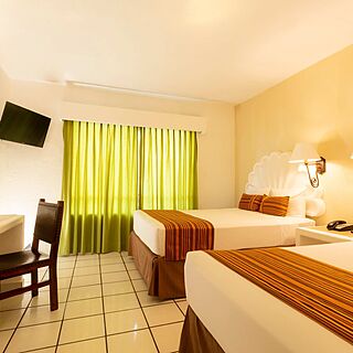 Hotel Las Palmas Beach Resort — Sample Bedroom
