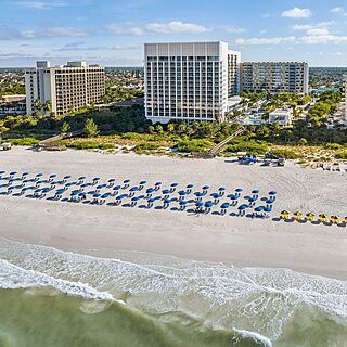 Marriott's Crystal Shores — Resort Grounds Beach View With Loungers and Umbrellas
