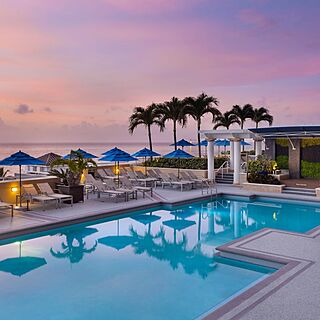 Marriott's BeachPlace Towers — Outdoor Pool With Loungers and Umbrellas