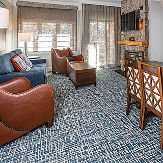 Marriott's Timber Lodge Tahoe — Sample Living and Dining Area With Fireplace