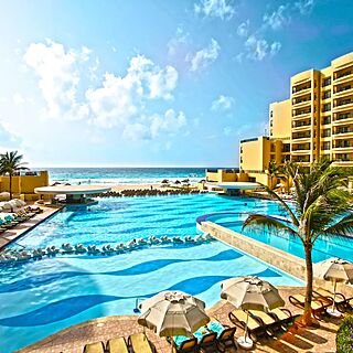 The Royal Sands — South Pool Area With Loungers and Umbrellas