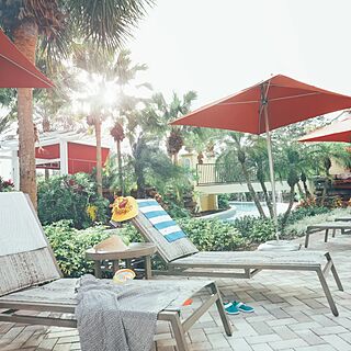 Holiday Inn Club Vacations at Orange Lake Resort - River Island — Pool Area With Loungers and Umbrellas