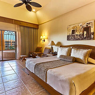 Royal Haciendas — Sample Bedroom With Attached Balcony