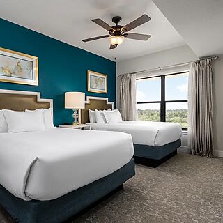 Holiday Inn Club Vacations at Orange Lake Resort - River Island — Sample two-bedroom Signature villa bedroom