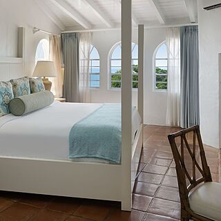 Representative one-bedroom villa with king bed and ocean view